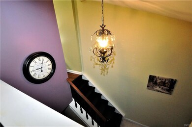 Lovely Foyer graces your entrance.