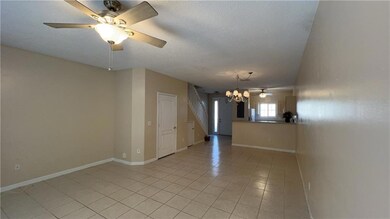 View of open kitchen with room for stools