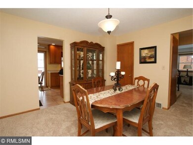 Main level formal dining room with access to the k
