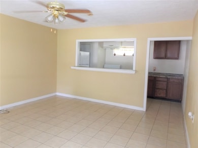 Living area with view of kitchen