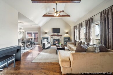 Family Room with Vaulted and Beamed Ceiling
