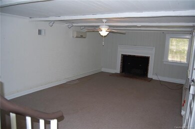 BASEMENT WITH LARGE FAMILY ROOM AND GAS FIREPLACE.