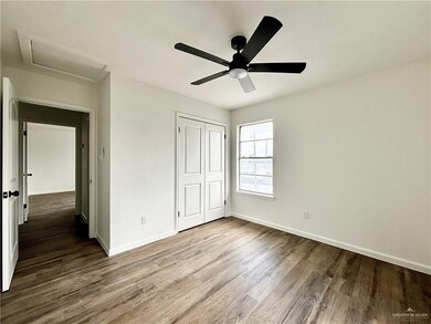 Unfurnished bedroom featuring wood-type flooring, a closet, and ceiling fan