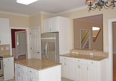 Open kitchen w/SS appliances.