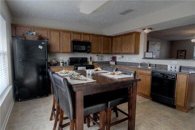 Huge eat-in kitchen- all appliances stay!
