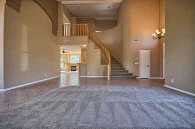 Formal Living Room with Grand Staircase
