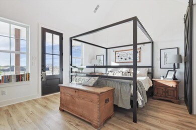 Primary suite features private door to patio.