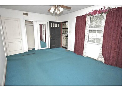 Living Rm or former Master Bedroom with double clo