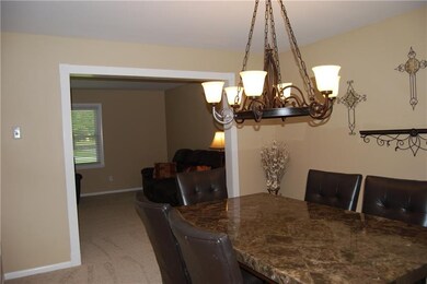 Dining Room Opens to the Family Room and Kitchen. 