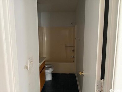 Full bathroom with toilet, shower / washtub combin