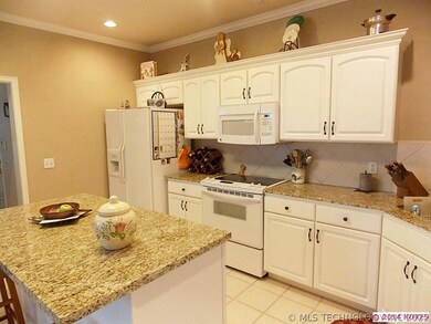 Beautiful kitchen and the refrigerator stays!