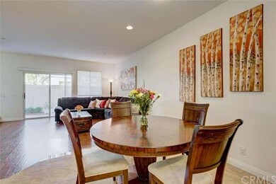 Wood laminate floors in the family room are both b