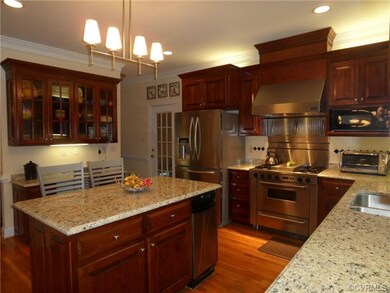 Kitchen has desk area and double pantry plus hall 