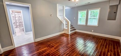 Lots of light, new windows, beautiful flooring.
