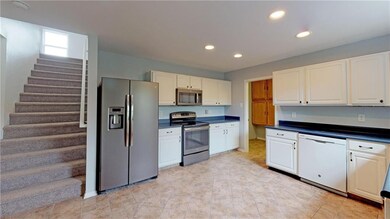 Loads of counter and cabinet space in the spacious Kitchen!