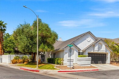 Single story home featuring a garage, a chimney, c