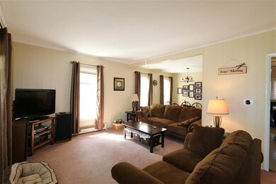 Living room open to dining room - Baseboard hot wa