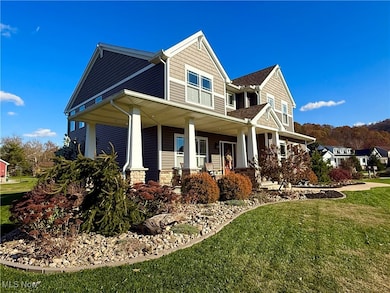 Front view with beautiful mature landscaping