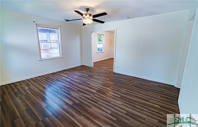 The spacious living room is the perfect spot to relax after a long day.