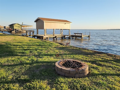 Boat house with fish cleaning station and sunbathi