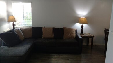 Living room with lots of light through the new win
