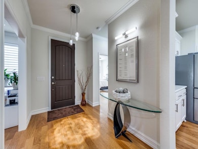 Entryway featuring light wood-type flooring and cr