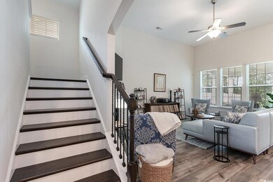 Living room with hardwood / wood-style floors and 