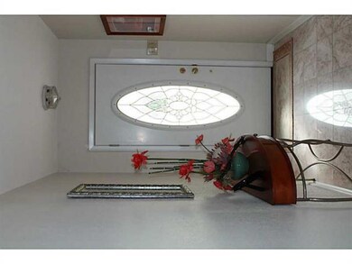 Foyer. Gorgeous marble flooring welcomes you in th