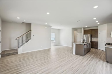Kitchen with appliances with stainless steel finis