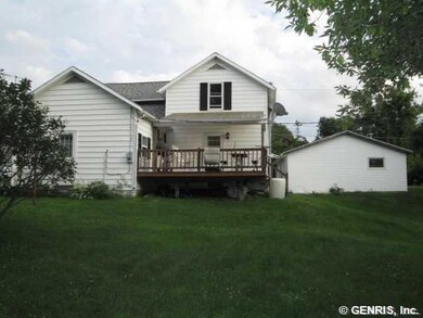 Exterior Back NICE LARGE REAR DECK AND LARGE YARD