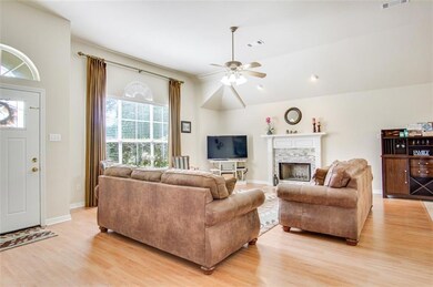 SPACIOUS LIVING ROOM WITH WOOD FIREPLACE