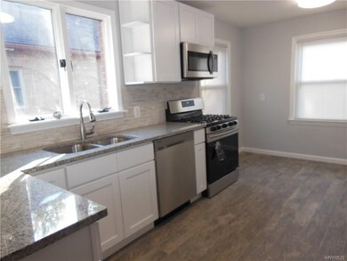 Granite counters and brand new cabinets.