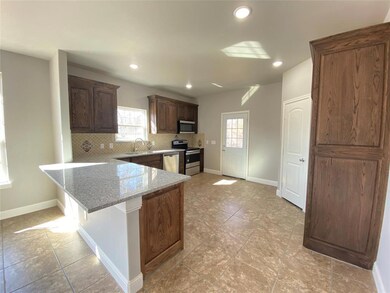 653 Dewey St, Cleburne, TX 76031 - photo 7