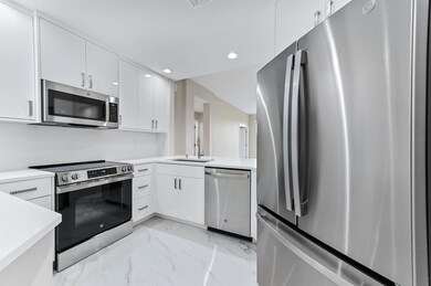 12510 Crystal Pointe Dr unit 102, Boynton Beach, FL 33437 - photo 2