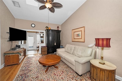 LIVING ROOM TO THE AIR CONDITIONED BONUS ROOM