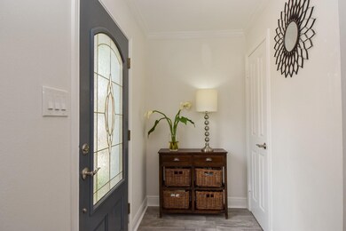 Front entry with leaded glass door and coat closet