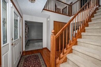 Entryway featuring light hardwood floors and a tex