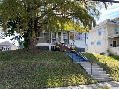 Beautiful front porch welcomes all of your guests 