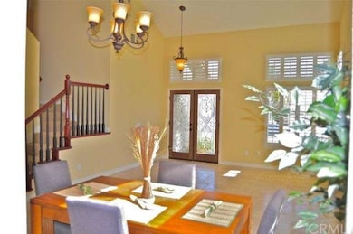 Living room with travertine flooring, custom paint