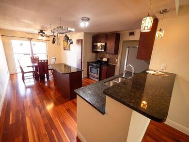 Kitchen featuring appliances with stainless steel