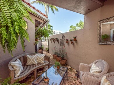 Private outdoor courtyard with a comfortable seati