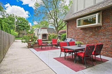 patio with wood burning fire place