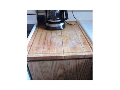 Kitchen. Hey!  Who put the coffee pot on my BUTCHE