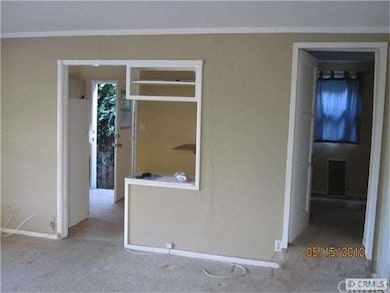 DOORWAYS TO BEDROOM AND KITCHEN