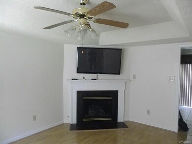 FAMILY ROOM WITH FIREPLACE/TRAY CEILING