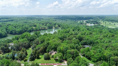 Ariel view of front with view of community lake