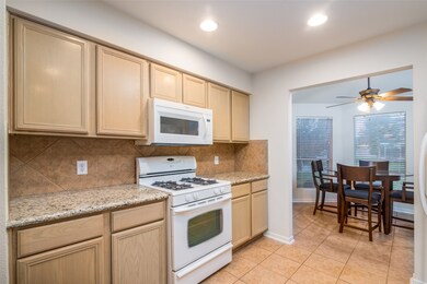 Gas range and built-in microwave.