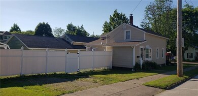 Fenced back yard and parking along Smock