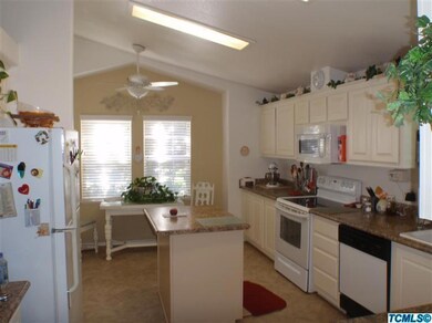 Kitchen view, showings newer counter top