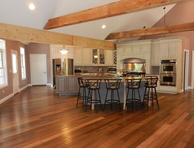 Kitchen view with islands and cabinets
